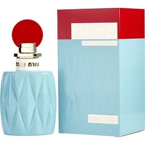 Miu Miu Light Blue Bottle with Bold Red Cap